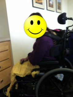 This client in a wheelchair demonstrates pelvic and spinal rotation to the left side.