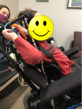 Client is reclined back in a manual wheelchair to maintain a forward head and decrease the force of gravity